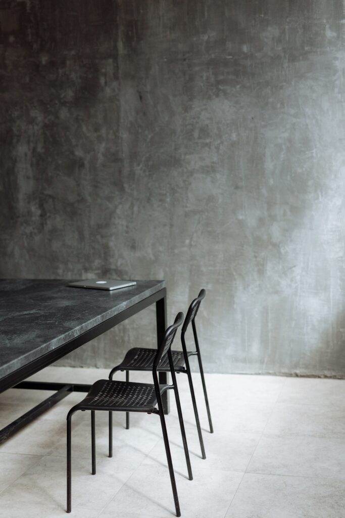 green granite table with iron legs